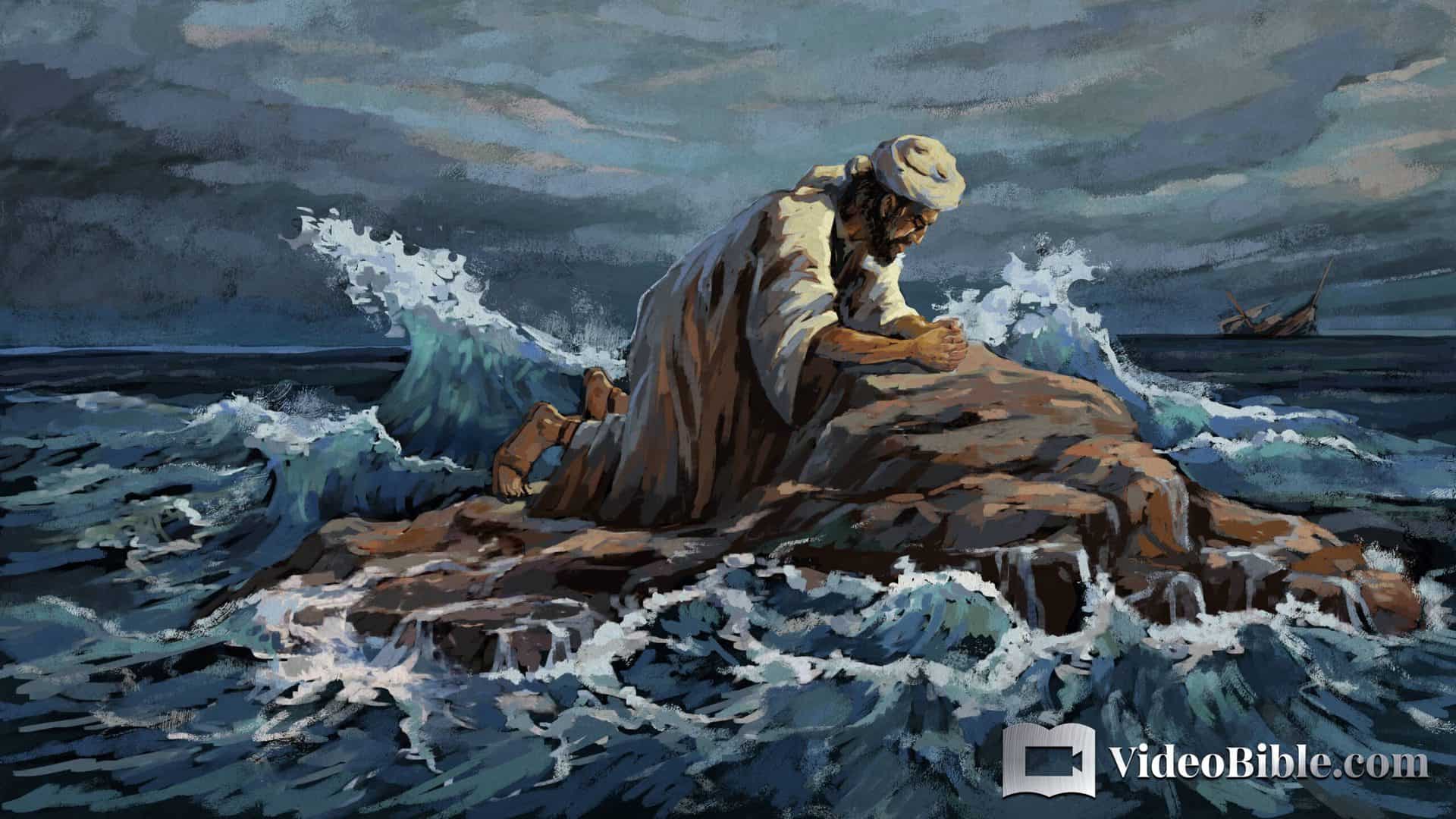 man praying on the rock of God in the ocean with waves crashing
